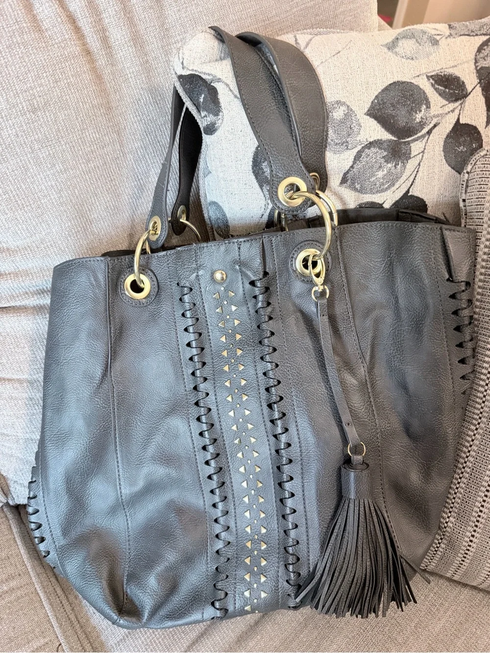 Steve Madden Black Leather Tote with Tassel and Gold Accents